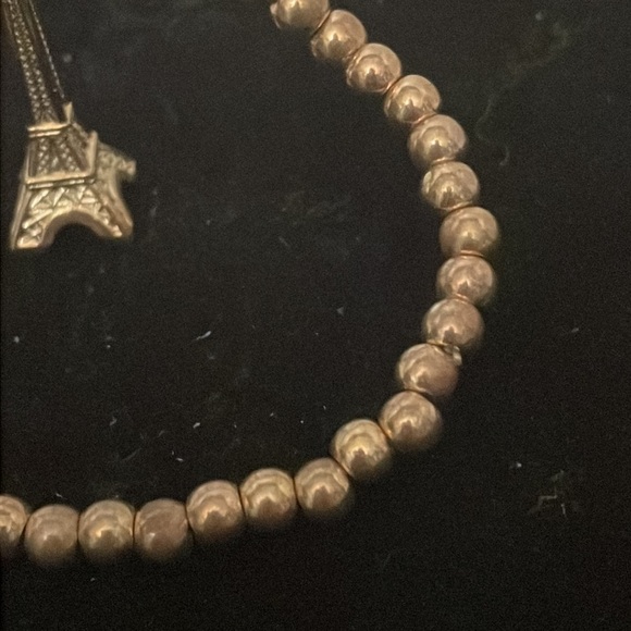6” golden beaded stackable stretch bracelet with Eiffel Tower pendant & 39 beads - Picture 5 of 11